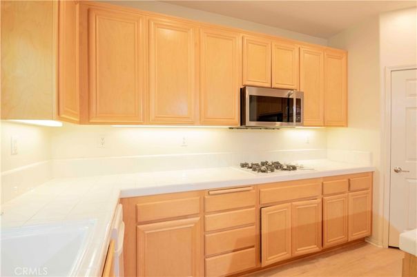Interior, Kitchen, Tile Countertops, Wood Texture Flooring