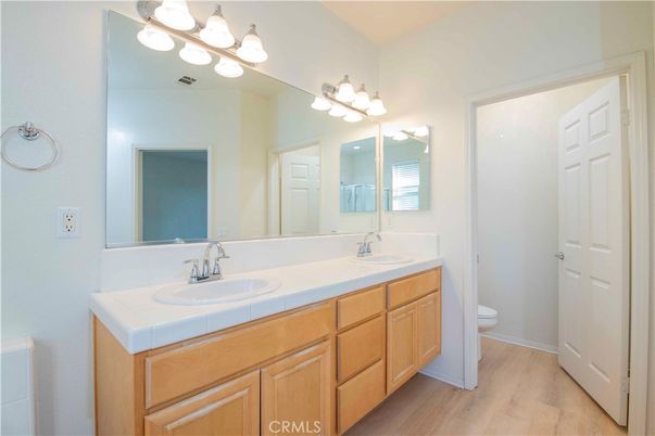 Bathroom, Dual Sink Vanities, Interior, Tile Countertops, Wood Texture Flooring