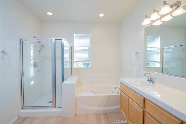 Bathroom, Glass Shower, Interior, Recessed Lighting, Tile Countertops, Wood Texture Flooring