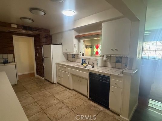 Interior, Kitchen, Recessed Lighting, Tile Countertops
