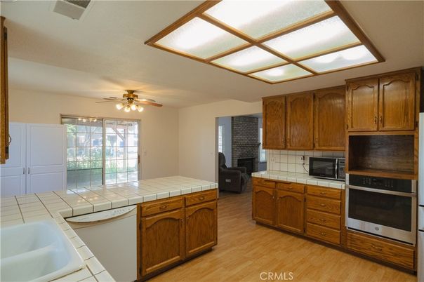 Interior, Kitchen, Tile Countertops, Wood Texture Flooring