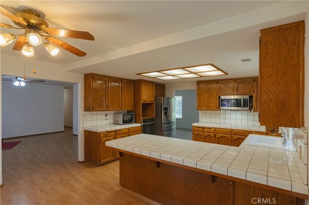 Interior, Kitchen, Tile Countertops, Wood Texture Flooring