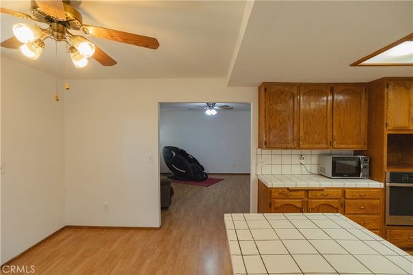 Interior, Kitchen, Tile Countertops, Wood Texture Flooring