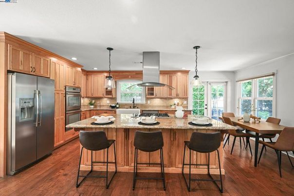 Dining room, Interior, Kitchen, Pendant Lights, Recessed Lighting, Stainless Steel Appliances, Wood Texture Flooring