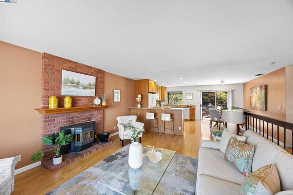 Dining room, Fireplace, Interior, Kitchen, Living room, Recessed Lighting, Stone Walls, Wood Texture Flooring