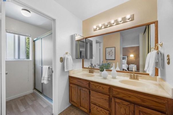 Bathroom, Dual Sink Vanities, Glass Shower, Interior, Wood Texture Flooring