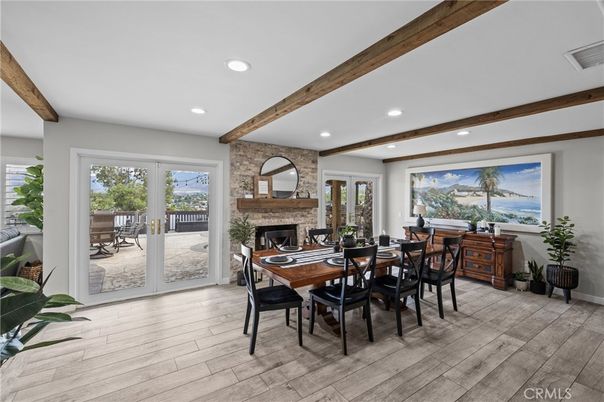 Dining room, Fireplace, Interior, Recessed Lighting, Stone Walls, Wooden Beams, Wood Texture Flooring