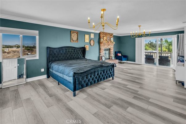 Bedroom, Chandelier, Fireplace, Interior, Wood Texture Flooring