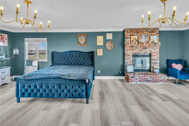 Bedroom, Chandelier, Fireplace, Interior, Wood Texture Flooring
