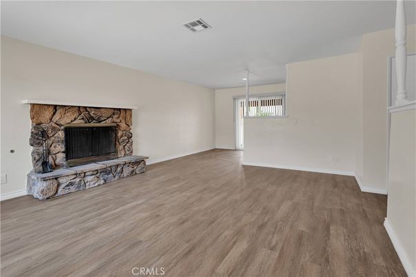 Empty room, Fireplace, Interior, Recessed Lighting, Wood Texture Flooring