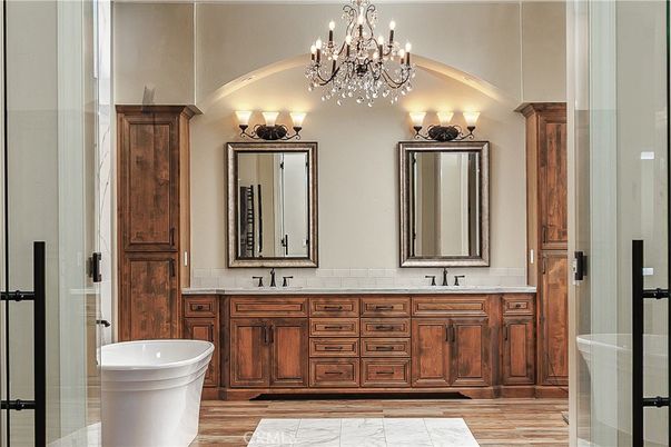 Bathroom, Chandelier, Dual Sink Vanities, Free Standing Baths, Interior, Marble, Wood Texture Flooring