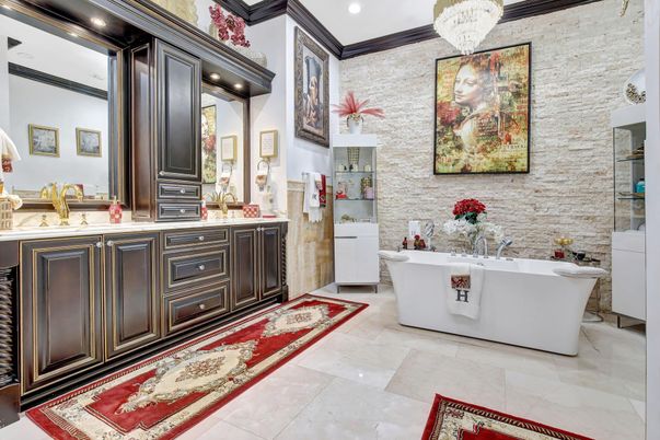 Bathroom, Chandelier, Dual Sink Vanities, Free Standing Baths, Interior, Marble, Recessed Lighting, Stone Walls