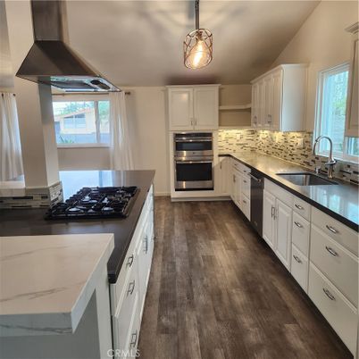 Interior, Kitchen, Pendant Lights, Stainless Steel Appliances, Wood Texture Flooring
