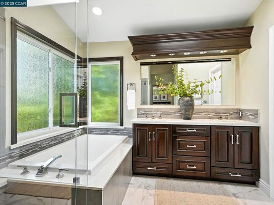 Bathroom, Dual Sink Vanities, Glass Shower, Interior, Marble, Recessed Lighting