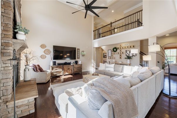 Fireplace, Interior, Living room, Recessed Lighting, Stone Walls, Wood Texture Flooring