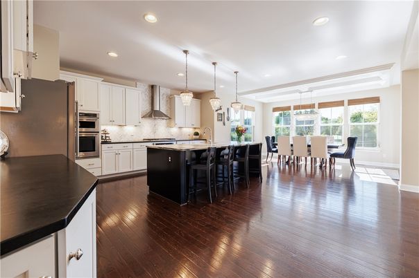 Dining room, Interior, Kitchen, Pendant Lights, Recessed Lighting, Stainless Steel Appliances, Wood Texture Flooring