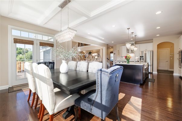 Chandelier, Dining room, Interior, Kitchen, Pendant Lights, Recessed Lighting, Stainless Steel Appliances, Wood Texture Flooring