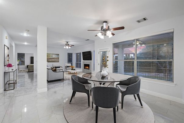 Dining room, Fireplace, Interior, Living room, Marble, Recessed Lighting