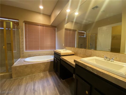 Bathroom, Dual Sink Vanities, Glass Shower, Interior, Recessed Lighting, Wood Texture Flooring