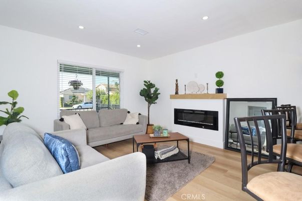 Fireplace, Interior, Living room, Recessed Lighting, Wood Texture Flooring