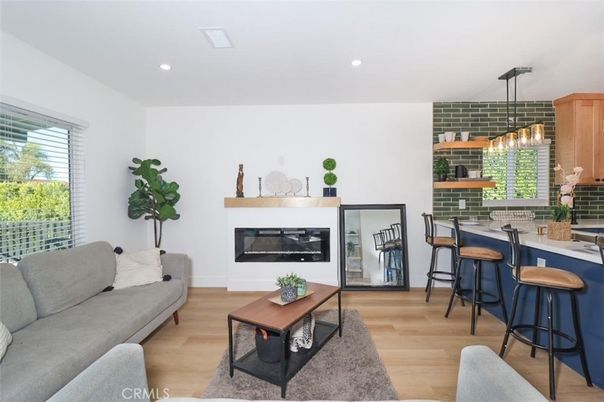 Fireplace, Interior, Living room, Pendant Lights, Recessed Lighting, Wood Texture Flooring