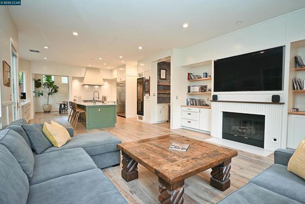 Dining room, Fireplace, Interior, Kitchen, Living room, Pendant Lights, Recessed Lighting, Stainless Steel Appliances, Wood Texture Flooring