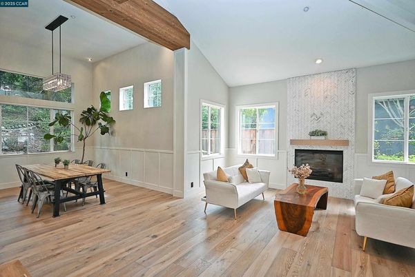 Dining room, Fireplace, Interior, Living room, Pendant Lights, Recessed Lighting, Wooden Beams, Wood Texture Flooring