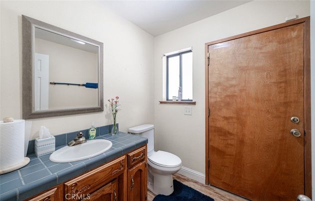 Bathroom, Interior, Tile Countertops, Wood Texture Flooring