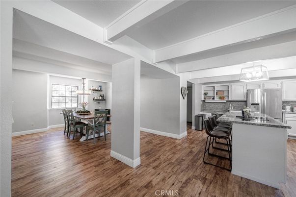 Dining room, Interior, Kitchen, Pendant Lights, Stainless Steel Appliances, Wood Texture Flooring