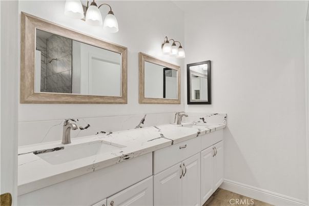 Bathroom, Dual Sink Vanities, Interior, Tile Countertops, Wood Texture Flooring