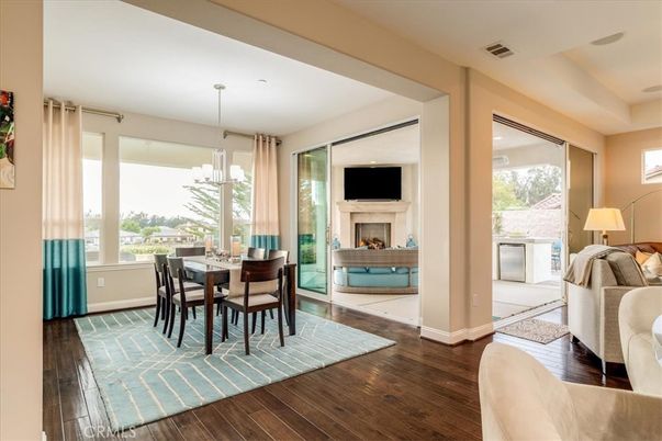 Chandelier, Dining room, Fireplace, Interior, Wood Texture Flooring