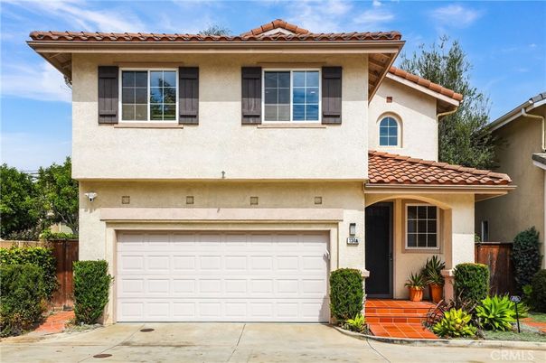 Attached, Exterior, Facade, Mediterranean