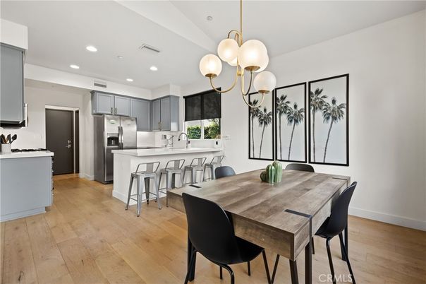Dining room, Interior, Kitchen, Pendant Lights, Recessed Lighting, Stainless Steel Appliances, Wood Texture Flooring