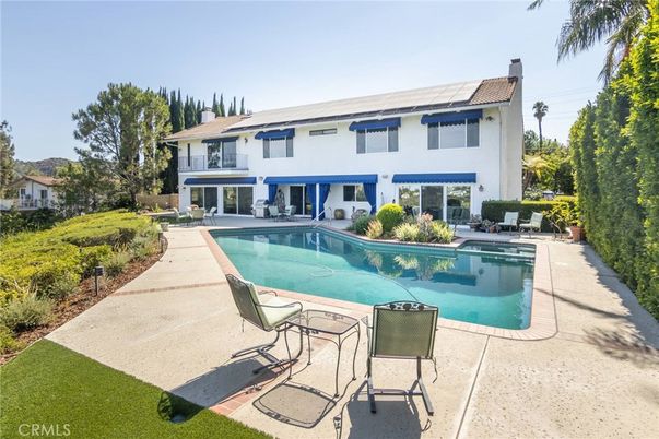 Exterior, Pool, Solar Panels