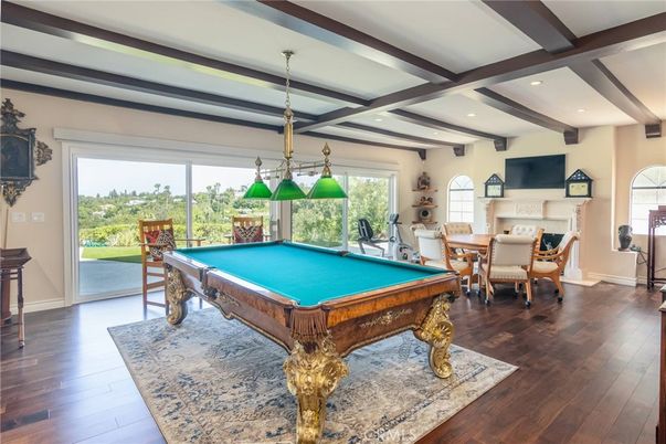 Billiard Table, Chandelier, Dining room, Game Room, Interior, Pendant Lights, Recessed Lighting, Wooden Beams, Wood Texture Flooring