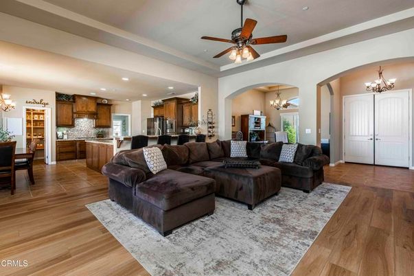 Chandelier, Dining room, Interior, Kitchen, Living room, Recessed Lighting, Stainless Steel Appliances, Wood Texture Flooring