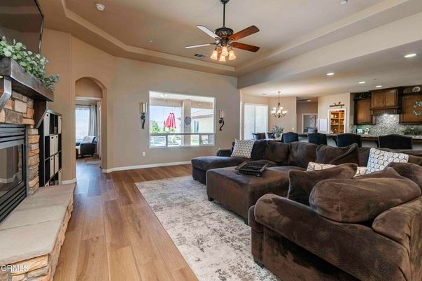 Chandelier, Dining room, Fireplace, Interior, Kitchen, Living room, Recessed Lighting, Wood Texture Flooring