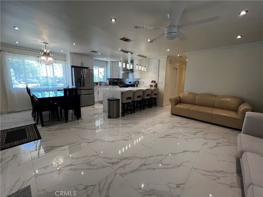 Chandelier, Dining room, Interior, Kitchen, Living room, Marble, Pendant Lights, Recessed Lighting, Stainless Steel Appliances