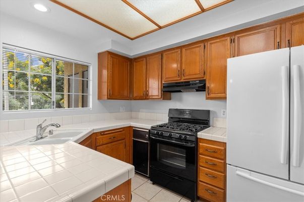 Interior, Kitchen, Recessed Lighting, Tile Countertops