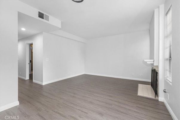 Empty room, Fireplace, Interior, Recessed Lighting, Wood Texture Flooring