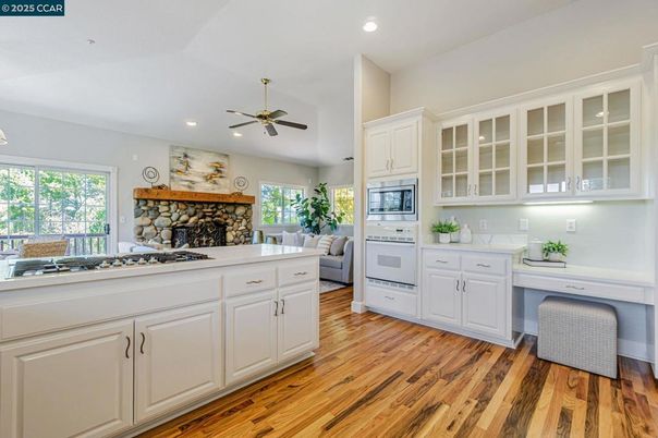 Fireplace, Interior, Kitchen, Recessed Lighting, Wood Texture Flooring