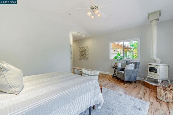 Bedroom, Fireplace, Interior, Recessed Lighting, Wood Texture Flooring