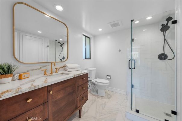 Bathroom, Dual Sink Vanities, Glass Shower, Interior, Marble, Recessed Lighting