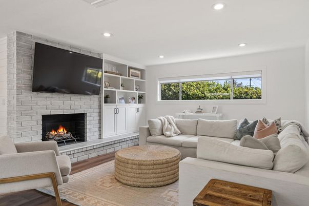 Fireplace, Interior, Living room, Recessed Lighting, Stone Walls, Wood Texture Flooring