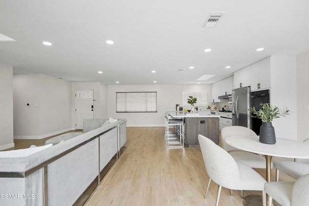 Dining room, Interior, Kitchen, Recessed Lighting, Stainless Steel Appliances, Wood Texture Flooring