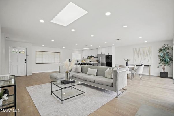 Dining room, Interior, Kitchen, Living room, Recessed Lighting, Stainless Steel Appliances, Wood Texture Flooring