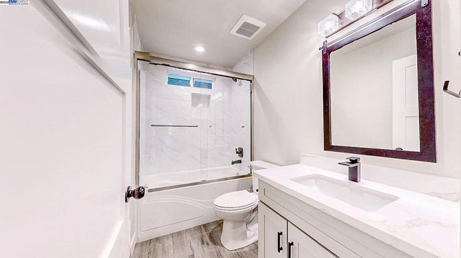 Bathroom, Glass Shower, Interior, Marble Walls, Recessed Lighting, Wood Texture Flooring