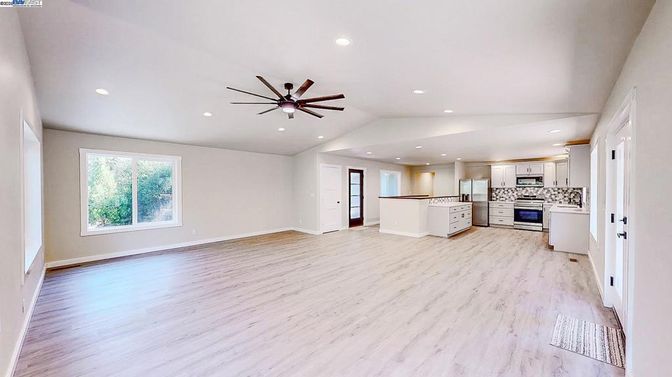 Empty room, Fireplace, Interior, Kitchen, Recessed Lighting, Wood Texture Flooring