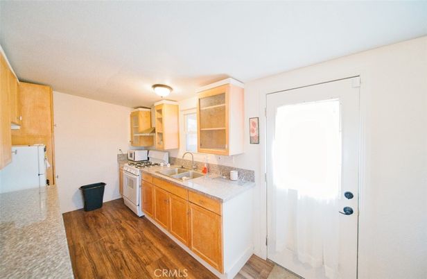 Interior, Kitchen, Tile Countertops, Wood Texture Flooring