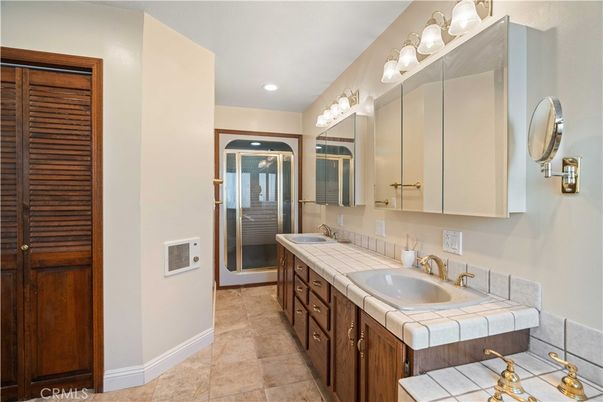 Bathroom, Dual Sink Vanities, Glass Shower, Interior, Recessed Lighting, Tile Countertops